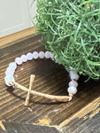 Pink Stretch Bracelet with Gold Metal Cross